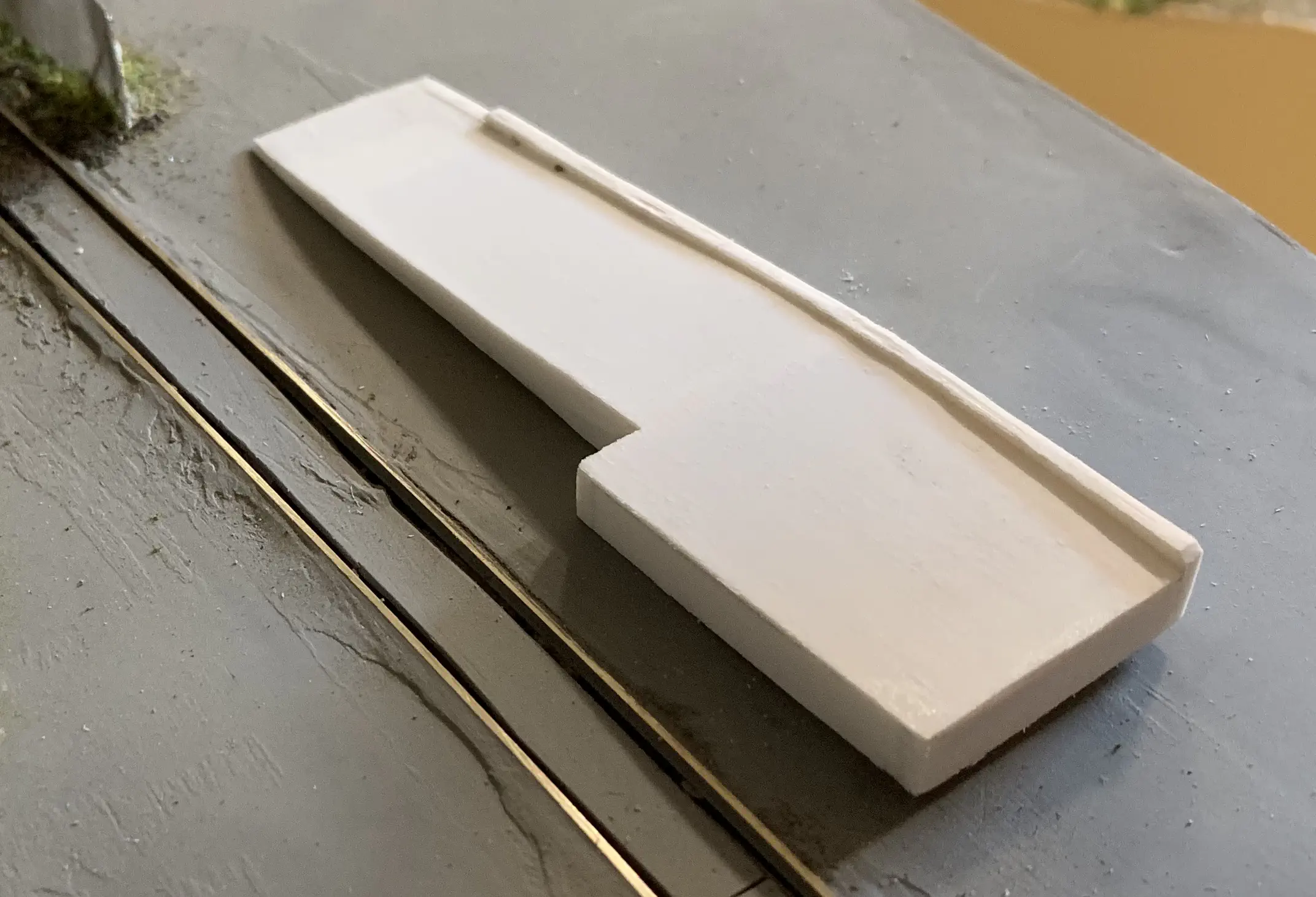 The ramp with wet paint. A sheet of “metal” is prepared.